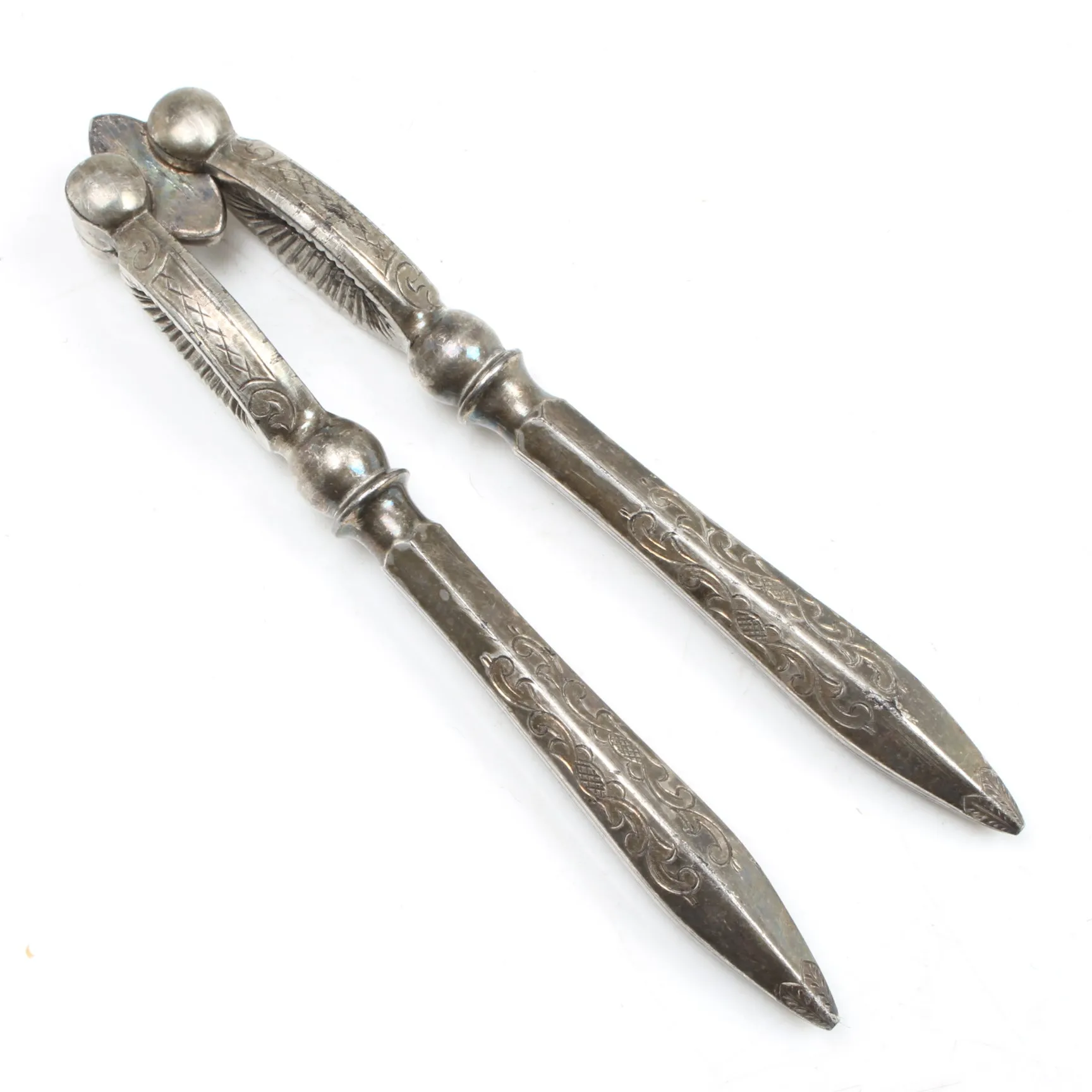Old Angular Etched Reversible Nutcrackers